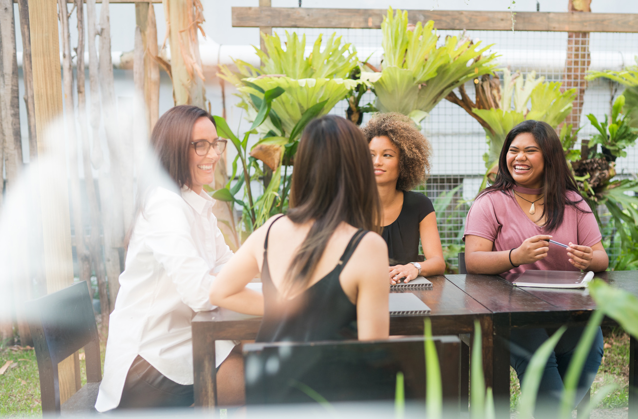 Workmates in a meeting outdoor.